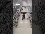 Moment knife-wielding migrant smashes bottles in Morrisons with blade as terrified shoppers flee