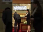 Aides filmed wiping down surfaces touched by North Korean leader Kim Jong Un
