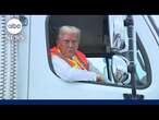 Trump speaks to reporters from garbage truck on campaign trail