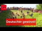Dutzende stürzen sich bei Käse-Rennen steilen Hügel hinunter