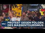 PROTESTE GEGEN ÜBERTOURISMUS IN SÜDEUROPA: Lissabon, Venedig und Mallorca demonstrieren gemeinsam!