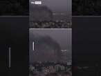 Black smoke billows over Beirut skyline