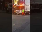 Moment woman breaks into bin lorry after being slapped by fuming workmen in ‘road rage’ row
