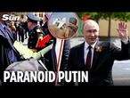 Moment terrified Putin is escorted by anti-drone rocket launcher on public walkabout