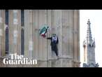 Protester with Palestinian flag scales Elizabeth Tower in central London