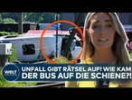 BELGIEN: Unfall gibt Rätsel auf! Wie kam der Schulbus auf die Schiene?!