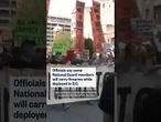 Officials say some National Guard members will carry firearms while deployed in D.C.