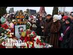 Parents of Alexei Navalny join hundreds of mourners on the anniversary of his death