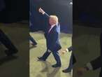 Shocking moment a cell phone is THROWN at Trump