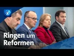 Koalition berät mit Arbeitgebern und Gewerkschaften