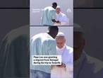 Pope Leo does '6-7' gesture with a migrant in Tenerife
