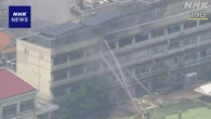東京 北区 小学校火事 教員“準備室で洗濯物乾かしていた”