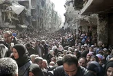 En las ruinas de Yarmuk, el campo de refugiados palestinos arrasado por la guerra en Siria: "Bashar Asad y Benjamin Netanyahu son lo mismo"