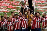 El ao loco del Atltico: de la ruina a la euforia