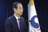 El Parlamento de Corea del Sur vota a favor de destituir al presidente interino Han Duck-soo