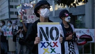 Dozens of protesters rally in Tokyo to demand Olympics get called off amid COVID surge