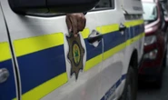 Police brigadier on the job, despite arrests for multimillion-rand fraud, corruption