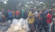 Teargas and tensions spike as stranded Malawians clash with cops in Durban