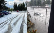 Zimowy widok w środku lata. Nawałnica z gradem nad miastem