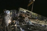 Train barrels into another in Pakistan, killing at least 51