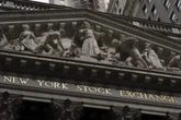 Stocks notch modest gains and a 3rd winning week for S&P 500