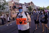 California celebrates reopening as many pandemic rules end