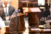 New Zealand mother accused of murdering children found in suitcases