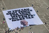 Protesters say Bezos' star-studded Venice wedding highlights growing inequality