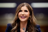 Noem faces protests as she gets doctorate at South Dakota university