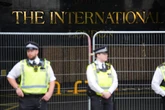 Woman charged with assault after migrant ‘walked into her flat’