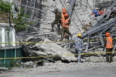 At least 3 dead and 17 missing after hotel collapses in Philippines