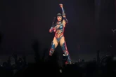 Katy Perry goes unnoticed by Scotland's soccer coach as his team shares a hotel with pop star