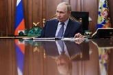 Putin directs drills of Russian nuclear forces as his summit with Trump is put on hold