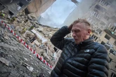 Zelensky seeks help at G7 as Russian bombardment kills at least 15