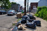 Trash is piling up in U.S. cities as thousands of workers go on strike