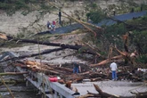 Ex-forecasters say Texas alerts were as timely as they shouldv’ve been