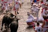 One man gored and others bruised in Spain’s bull running festival