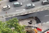 Migrant workers hailed as heroes for saving woman from sinkhole