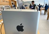Apple shelves ambitious self-driving car project, lays off staff
