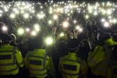 Met officers regularly took photos of dead bodies on their phones