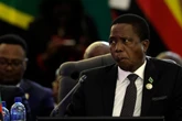 Last-minute court order halts former president’s burial