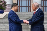 What Trump and Xi’s ‘power’ handshake reveals about the two leaders