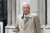 Professor hit with £180k court bill after bitter feud with neighbour
