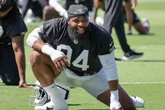 Raiders star cut from NFL team after meeting room kissing incident