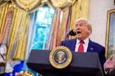 Ukraine live: Trump gives Putin two weeks to prove he wants to end war