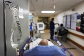 Hospital worker with Tourette’s says he was fired for ‘making faces’