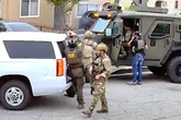 Heavily armed federal agents blow door off suspect’s home