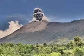 Volcano eruption spews debris into sky as ash falls on villages
