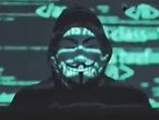 Elon Musk responds to Anonymous threats with crying laughing emoji