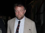 Guy Ritchie visits firefighters after they tackle fire at London pub